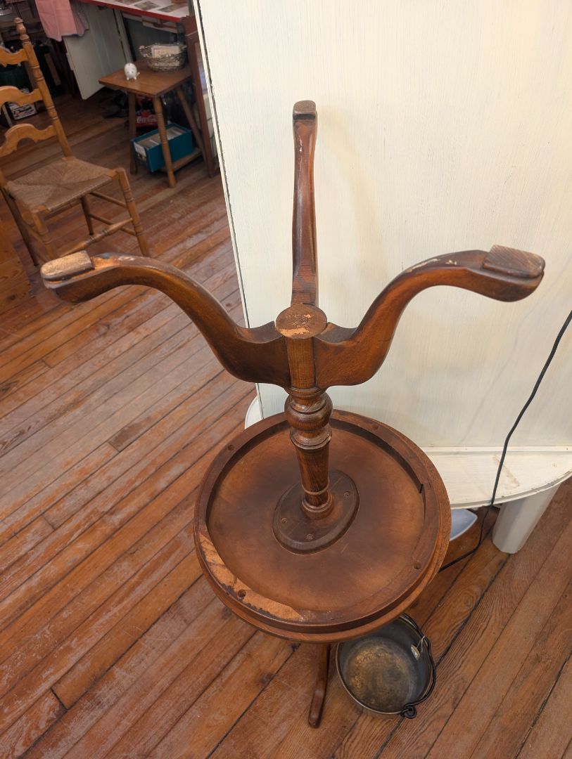 Matched pair of mahogany, three-leg and tables?
