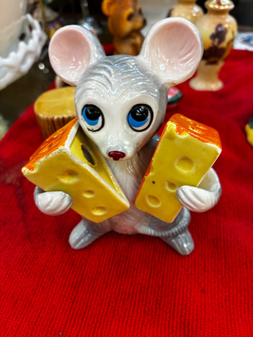 Mouse holding cheese