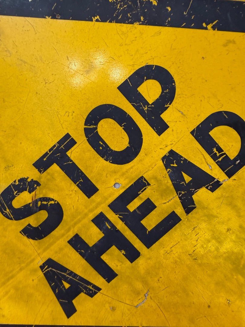 Vintage small stop ahead sign