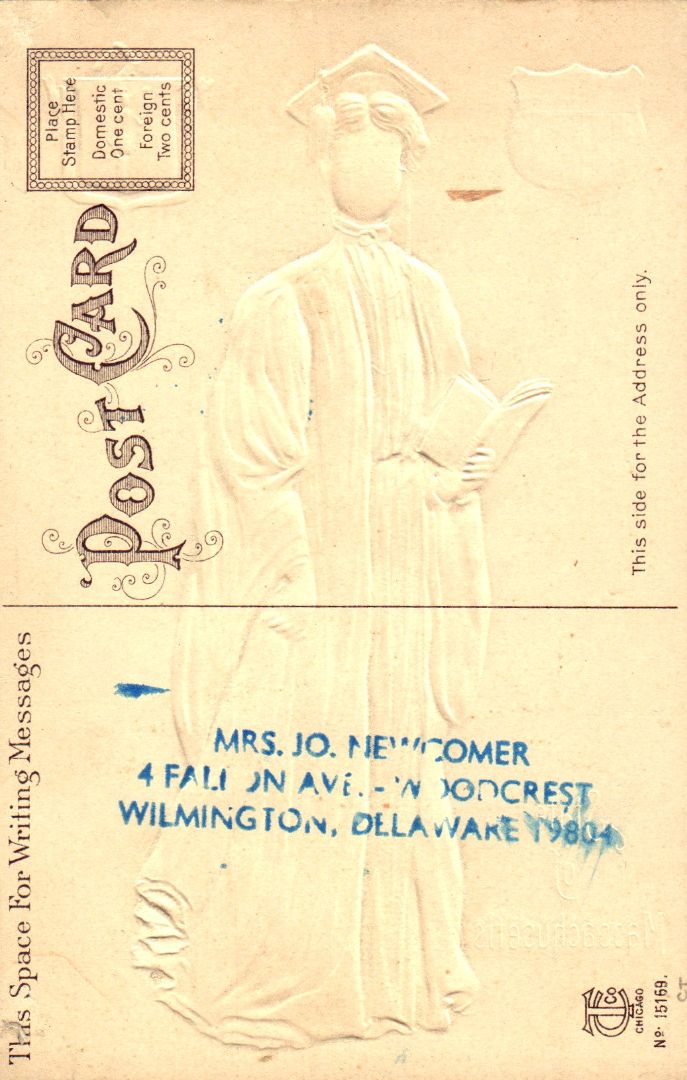 Women representing the State of Massachusetts wearing a collage graduation gown holding a book