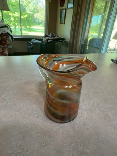 Hand blown art glass pitcher