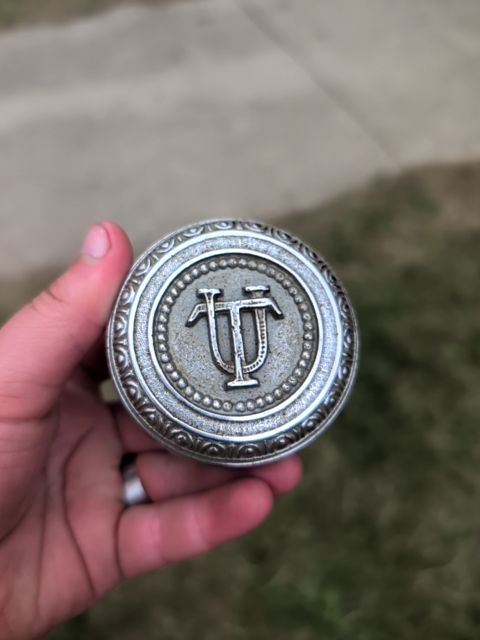 UT silver doorknob
