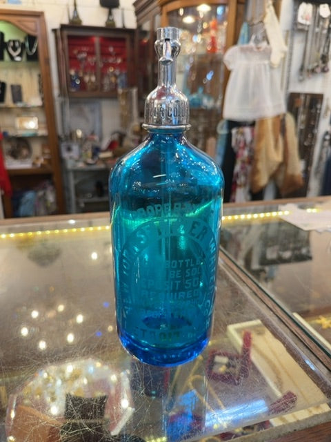Blue seltzer bottle