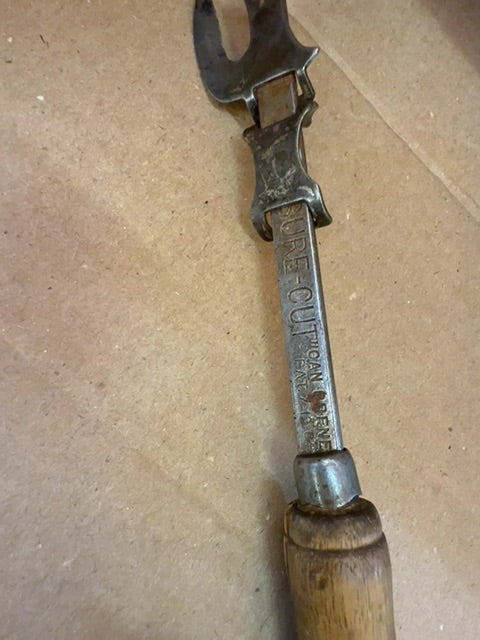Antique bottle/can opener