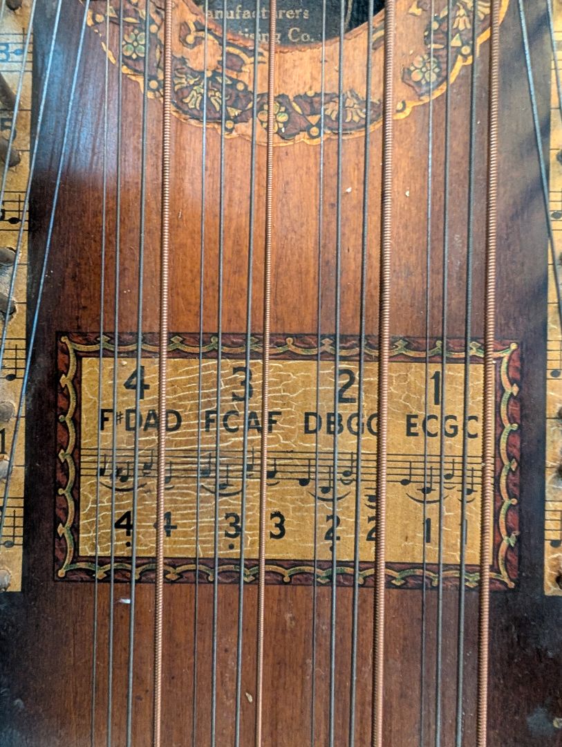 Ukeline lap harp.