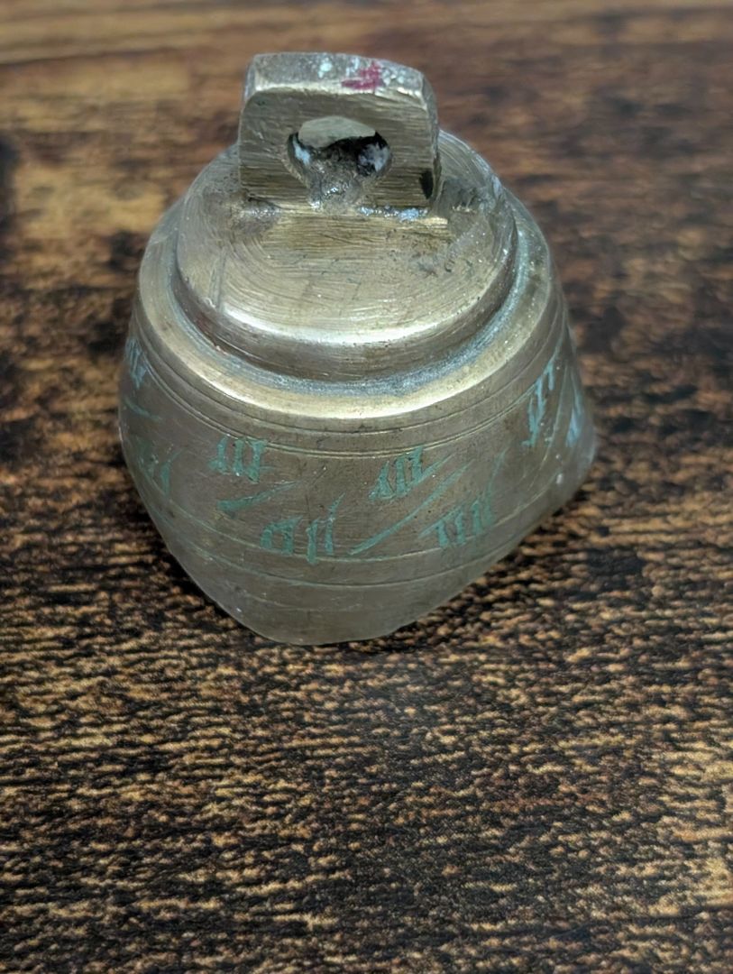 Gremlin bell with green lines