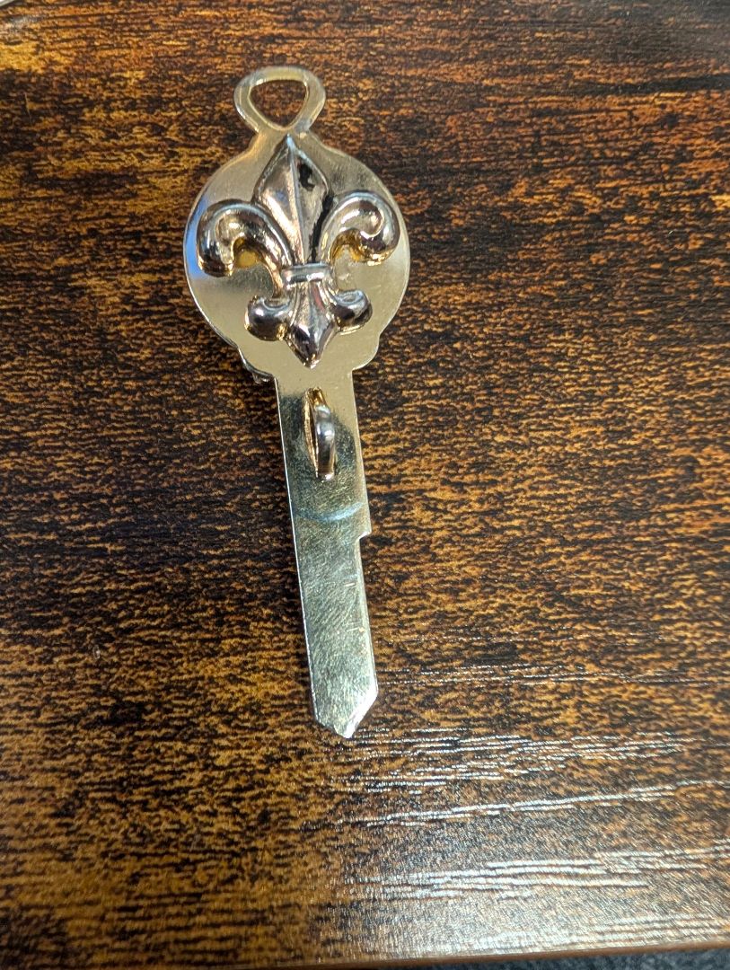 Tie clip key shape
