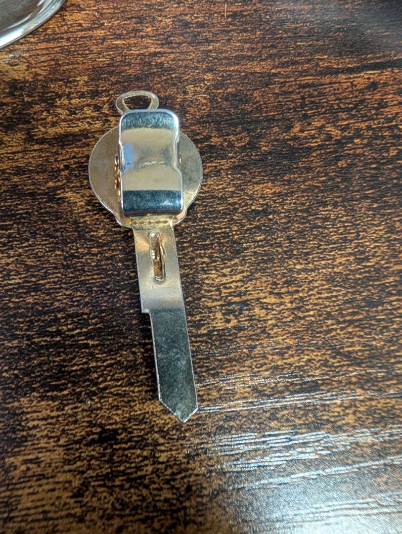 Tie clip key shape