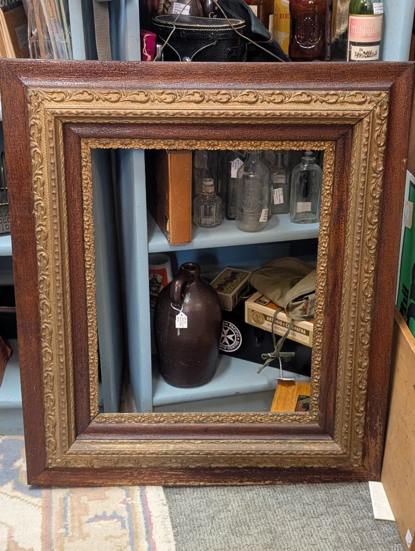 Victorian oak in plaster frame