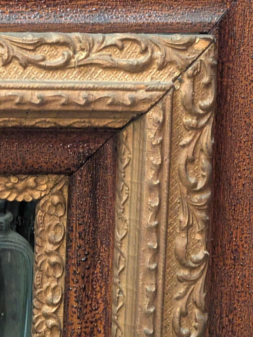 Victorian oak in plaster frame