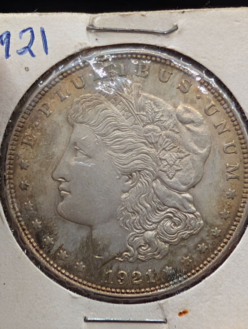 1921 toned uncirculated Morgan Dollar