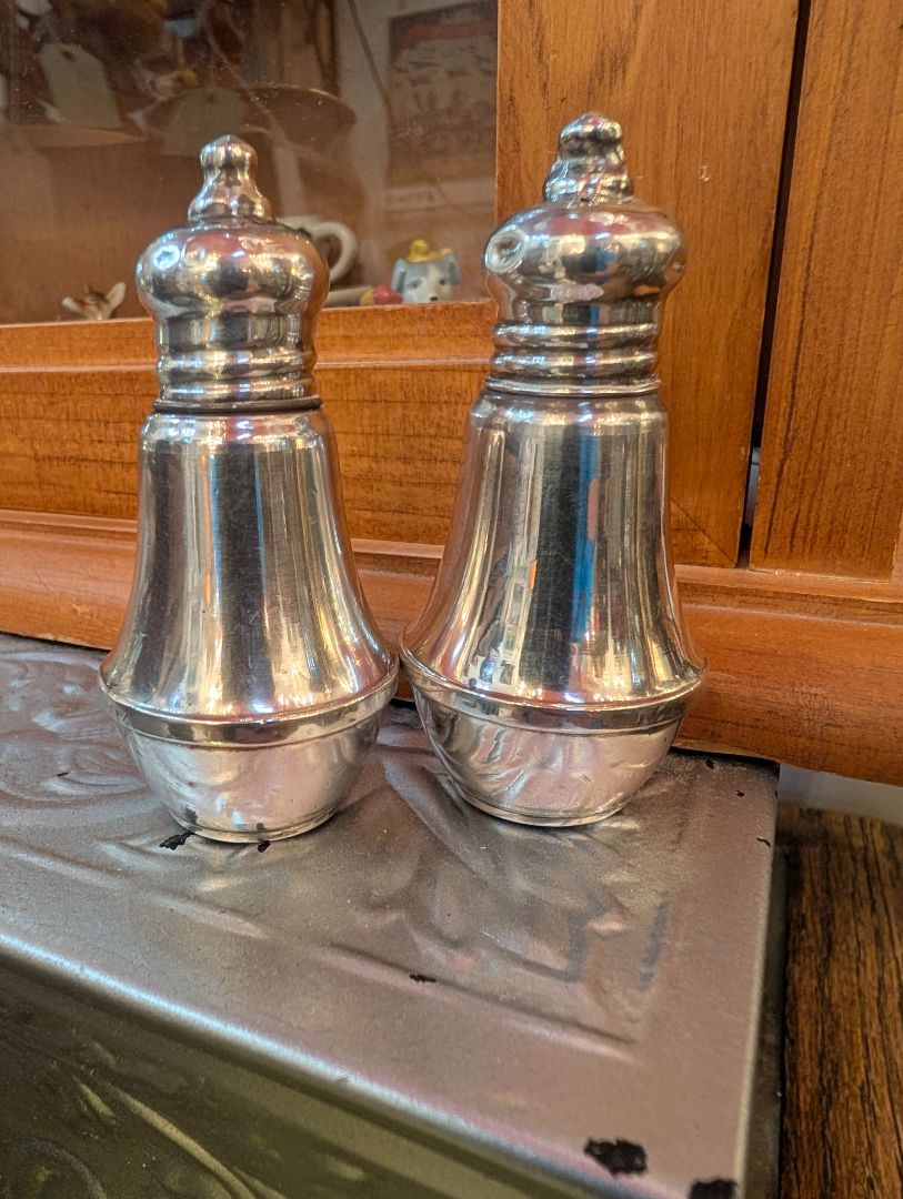 Weighted sterling silver salt and pepper shakers
