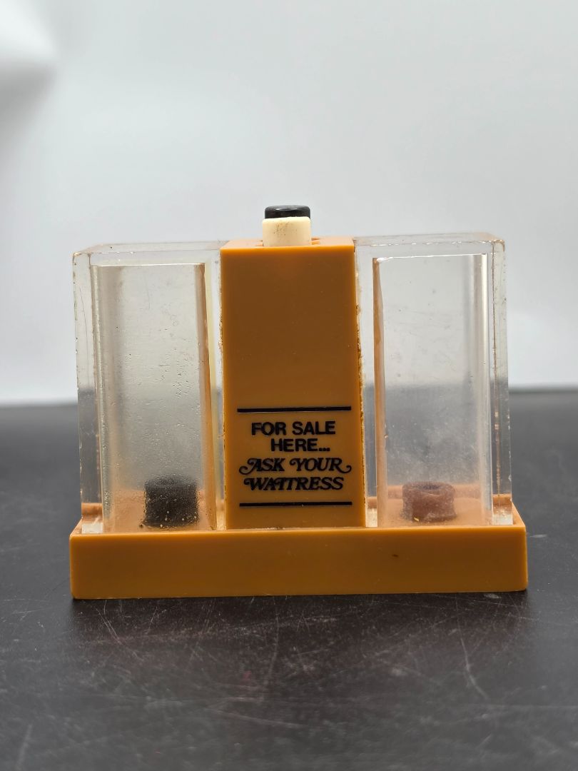 Vintage Whirley Industries plastic push-button salt and pepper shaker set
