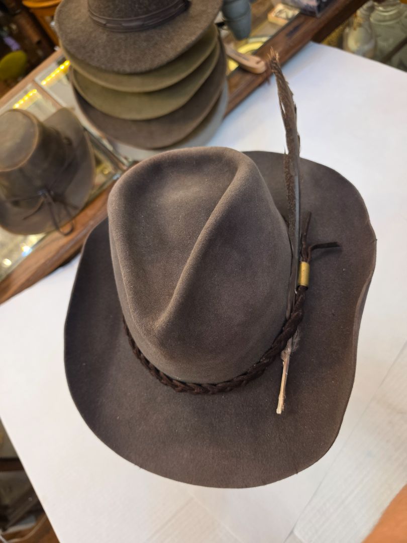 Resistol Hat with braided suede band and wild turkey tail feather