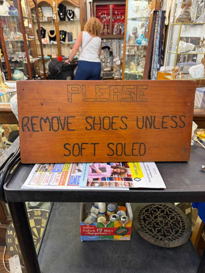 Vintage hand made no shoes sign