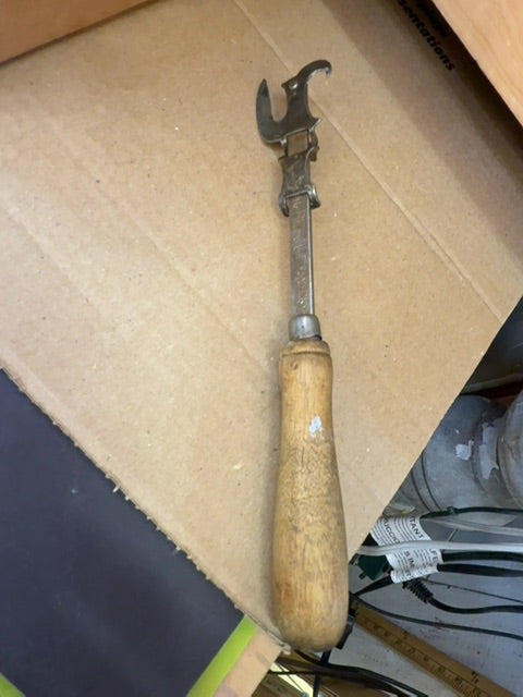 Antique bottle/can opener