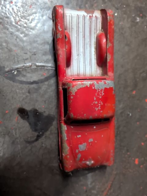 Vintage red pickup truck as is