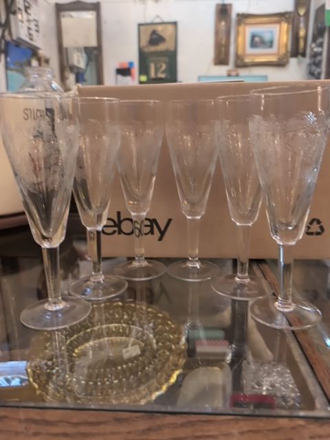 Etched roses in Champaign glasses
