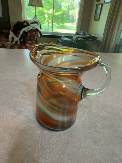 Hand blown art glass pitcher