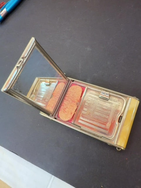 Vintage yellow compact