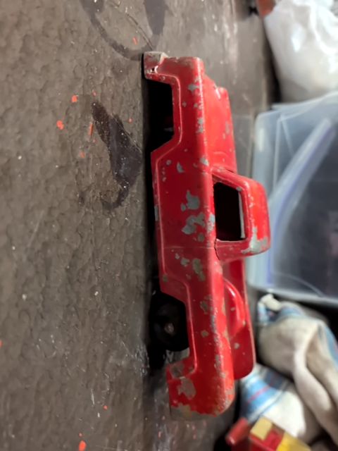 Vintage red pickup truck as is