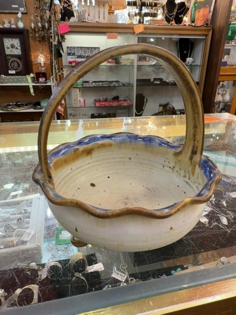 Pottery basket. Signed
